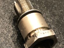 Modified spark plug to used as thread cleaning tool.