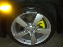 Front brake calipers, painted yellow. Looks good on an NG I think.