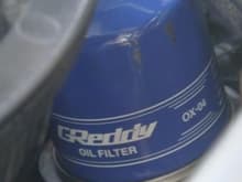 Greddy Oil Filter.. Dun see a difference with Stock Mazda.. and is more expensive.. Dont know why