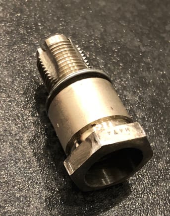 Modified spark plug to used as thread cleaning tool.