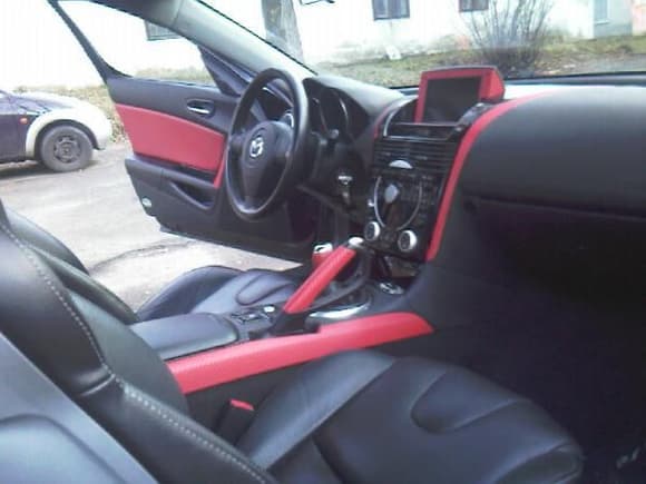 Red-black rear leather seats and door panels, red and black carbon vinyls... still in progress