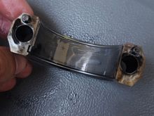 First layer compromised in places - These probably came off at an opportune time. Note "black" film bottom left of bearing and where the rod bolt holes are. Noticed an odd smell when the bearing cap came off too.