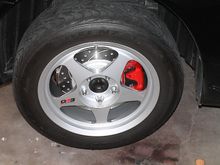 Painted calipers, drilled and slotted rotors.