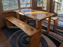 ^12-17-2025.  I had this bottle kill pine table with live edges custom made for me in January of 2018.  I found the benches to be too hard to sit on for any length of time so I had some cushions custom made to go with it. I decided it was time to upgrade.  