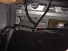 This is the power wire ready to go into the trunk from behind the passenger seat.