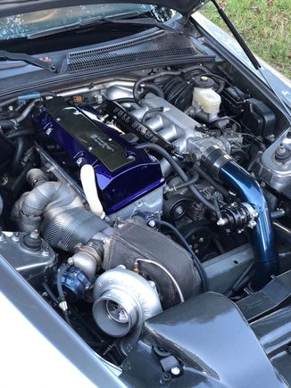 here is a sneak peek under the hood! the car is all together and running. InlinePRO is working out some o2 senor and boost issues. it looks like its maxing out at 14 psi and should be doing 18. So they are checking into I and i'll know more soon! its almost time!!!