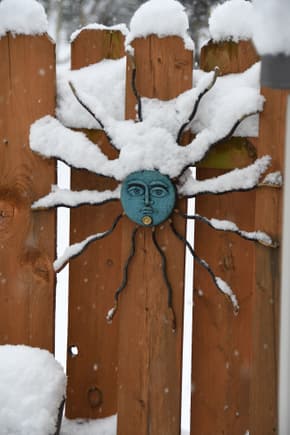We've collected a number of "faces" that hang on our fence.   Don't bother to bring them in during winter.  