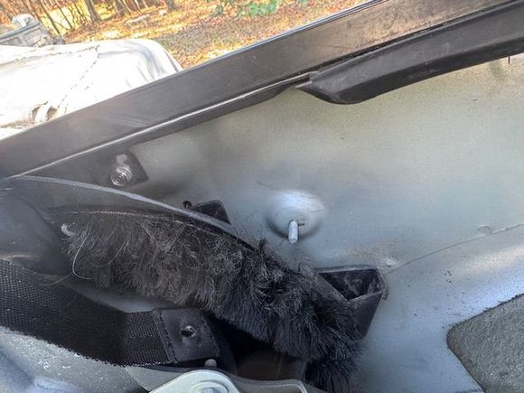 You can see where i mounted that little piece, the giveaway being the lighter colored, gray. double sided tape.  The brushes also indicate orientation.