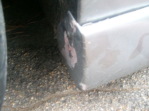 Paint chipping on front of driver skirt.