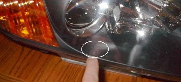 Hung Ly Heat Bubbles in front of Passenger HID on black plas