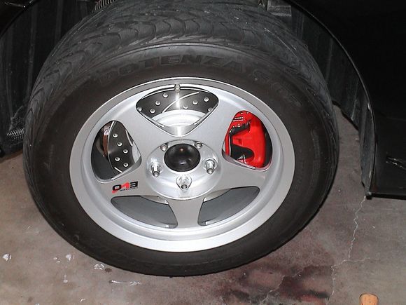 Painted calipers, drilled and slotted rotors.