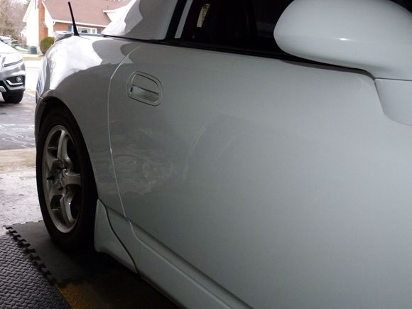 passenger side repainted from scratch, loooong ago