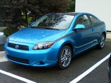 At the dealership in June 2010 shortly after I found her and immediately fell in love with the color (the blue looks a little greenish in this pic though). After looking at the price tag, I figured owning a car like this was probably just a dream but I worked really hard all summer to save up enough money to make a decent down payment and luckily she was still there in the fall and my dream actually came true. Still pinching myself to make sure it's real, LOL.