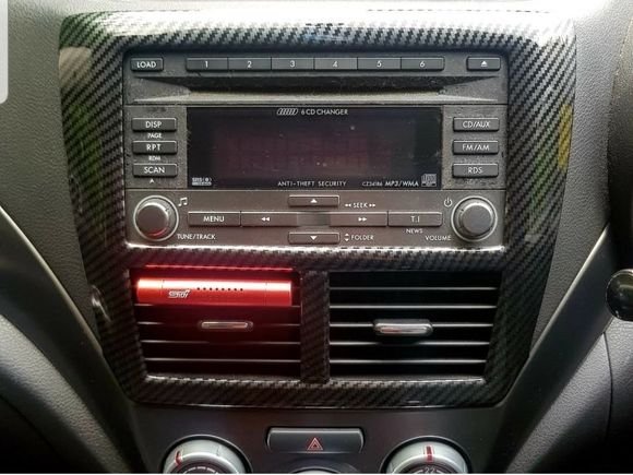 Carbon fiber stereo head unit surround. 