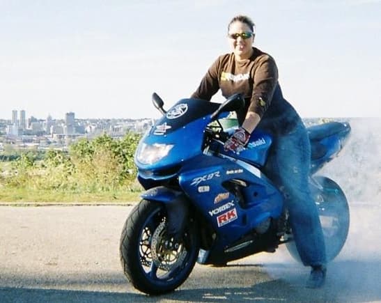 My favorite bike 99 Kawasaki ZX9R doing burnouts.  I did my first wheelie on this beauty. How I miss that bike.