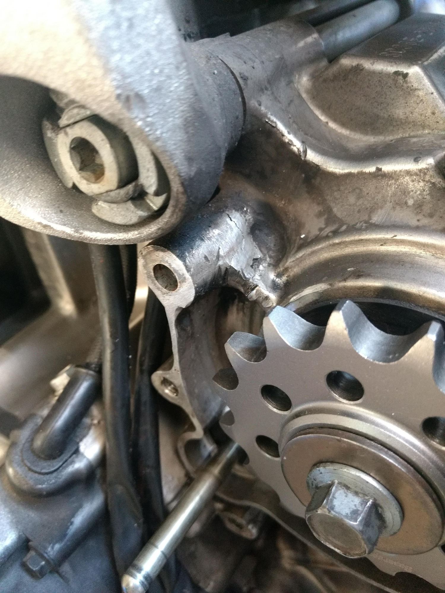 Damage discovered around front sprocket SuperHawk Forum