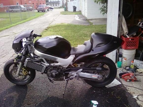 got the tail on and sanded and atleast painted it all satin black so I could ride it till my parts came in.