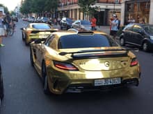 Arab supercar season just got real in London! Pure gold Mercedes-Benz SLS AMG Black Series and Ferrari 458 Speciale cruising on Sloane Street. It sure caught a lot of people's attention that day.