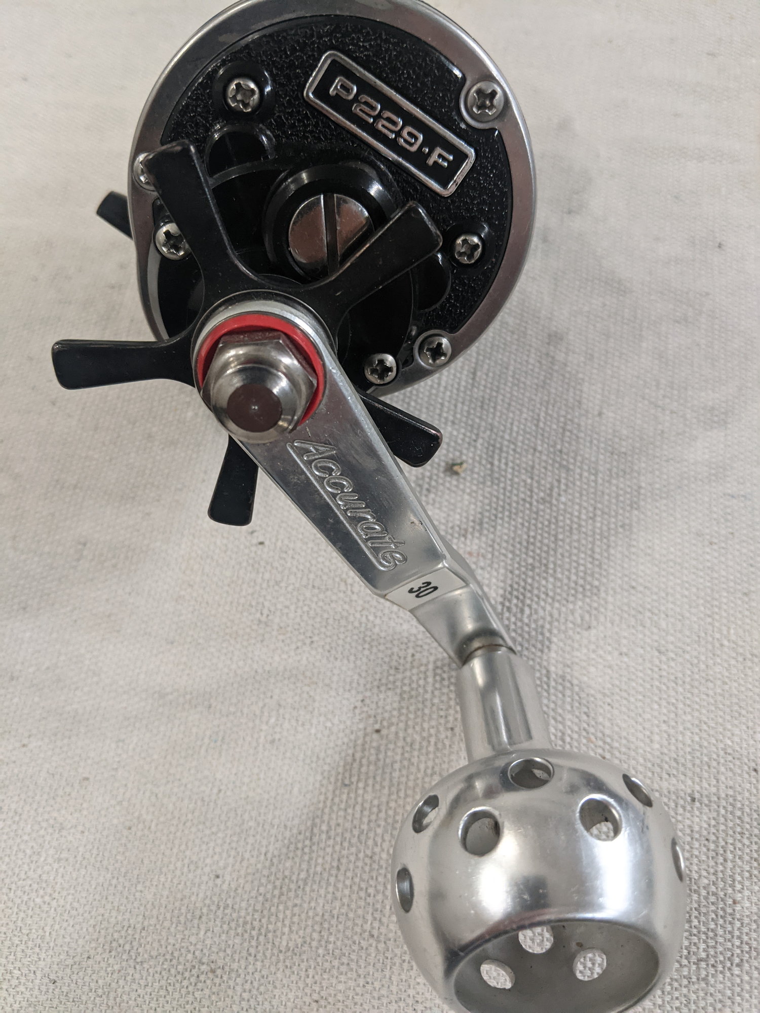 2 Newell Reels with Tiburon frames & 1 has an Accurate roller knob