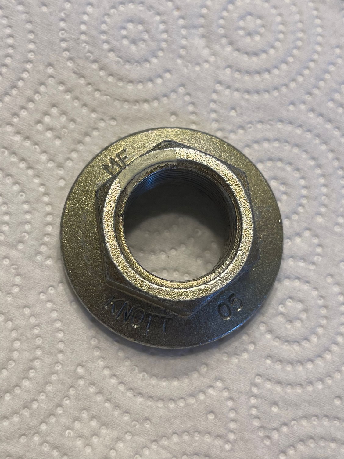 This axle “lock” nut with no cotter pin. Is it a special nut? The
