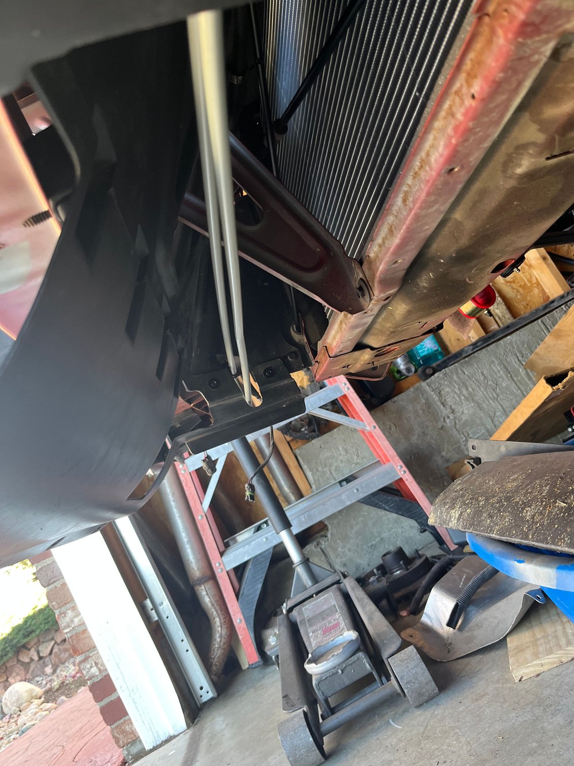 Factory power steering cooler cleaned and painted. 