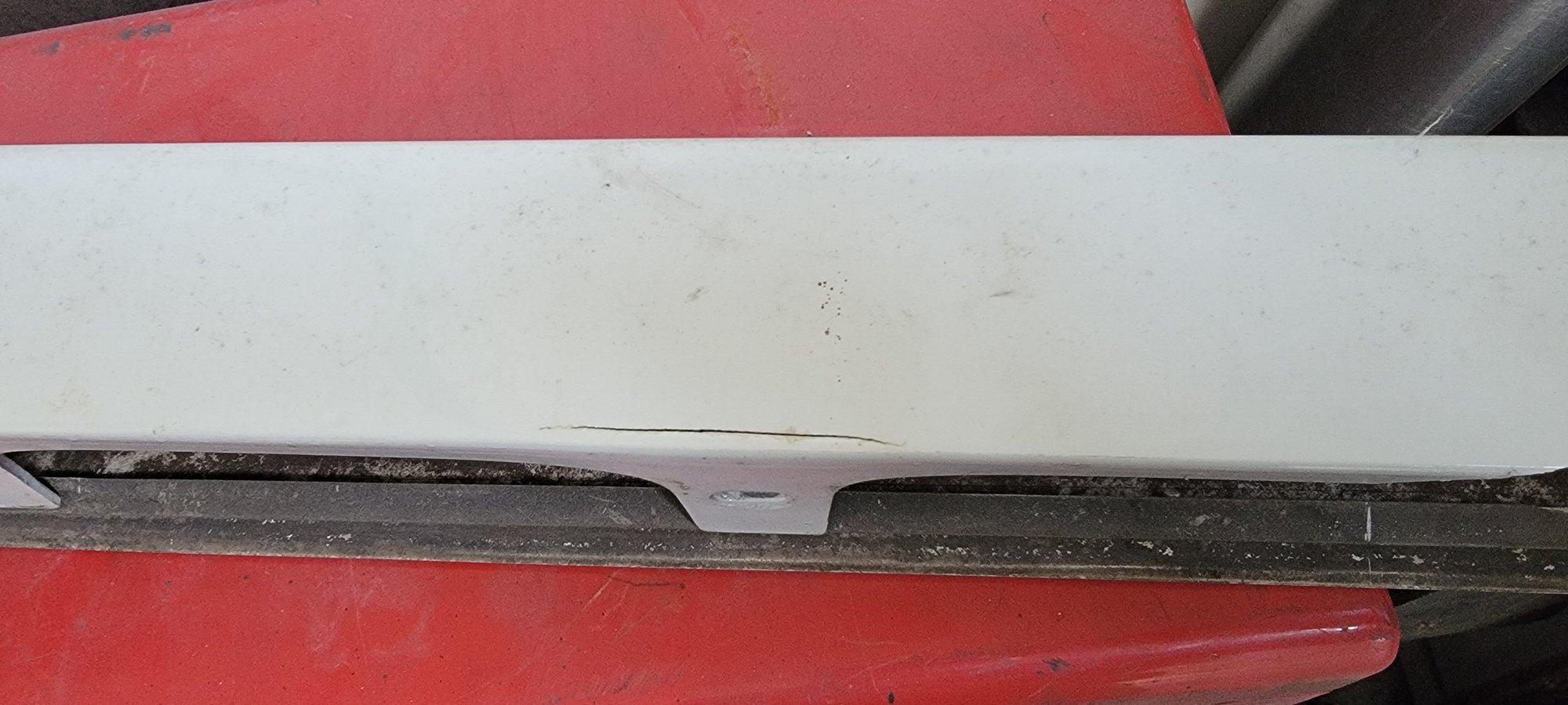 Small cracks by almost all mouning tabs. 