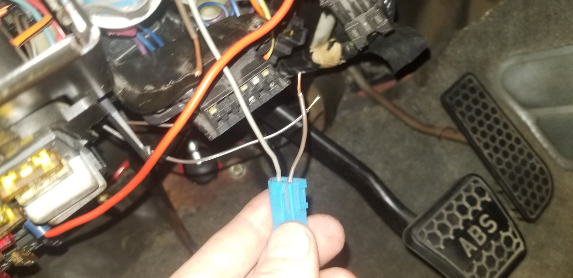 You can see the other end of the brown wire right next to where the orange/ grey cross in this pic.  BE SURE to leave enough length there for you to solder!