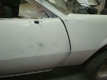 I just put 2 bolts in the top of the fender to hold it while sanding so the gap is way off however the first 2 Morrison Cook cars have what has been referred to as a "drooped nose" where the whole front dog house is pulled down so even once the fender is back is place the gap will still be a little wider at the top than the bottom. One of the guys who drove our Firehawk car back in the 80's asked me if I had figured out how it was done as they wondered how it got through tech.