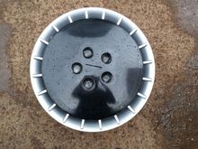 Fabricated bowling ball hubcap plug for the mould for 17" wheels.