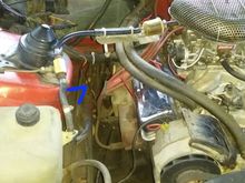 What are these two 'wires' for?  The top one is more like a vacuum tube; the bottom one connects to the block.