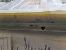 Few area where rust had formed.  I ground away to clean metal and filled with JB Weld, primed and painted.