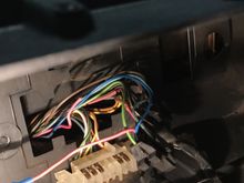 These are the plugs behind the gauge cluster. If you see those two pink wires, one of them isn't connected to anything, and the other one is connected to the plug and goes off to the left and into a blue plug. I was wondering if those two pink wires are actually supposed to be spliced together and if it actually goes to the speedometer or something else. And I wanted to know if anyone had a diagram of where all those wires actually go to.