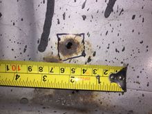 Hole on passenger front floor