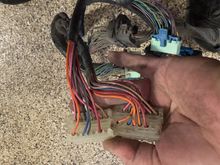 On this clear connector, on the old one there is an orange wire and orange/black wire where on the new, there is no orange/black and the orange next to it is a black/white wire. What are these differences?