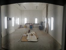 Here is what we have now. Added the separation wall with entry door and window. Piped in air from the main shop, added 12 LED lights, 9000cfm fan, paneled the ceiling/ walls.