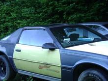 started sanding and priming the body to get rid of the peeling factory paint on a-pillars and roof