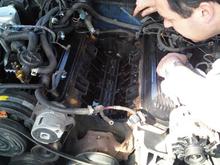 intake, etc. off while doing intake gasket...... my dad inspecting lol