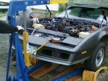 Taking the engine out....in the rain