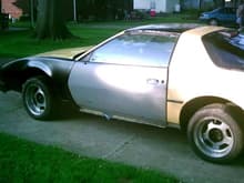 Picture of what the car looked like when I bought it. I bought aftermarket fenders and replacement doors the originals were so badly rusted.