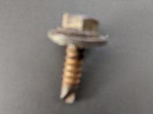 7mm self tapping screw about 5/8" or so long with washer.