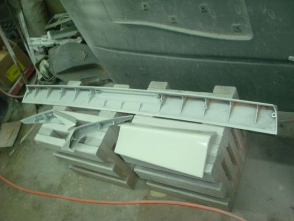 Light coat of epoxy on the undersides of the rear spoiler pieces.