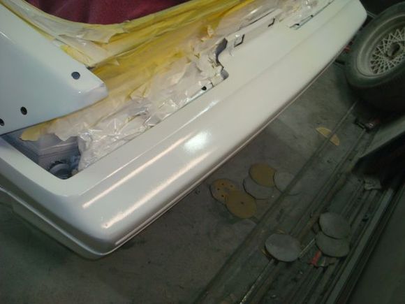 Driver rear bumper cover.