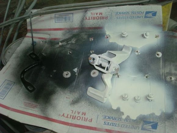 Spraying a little paint on misc hardware.