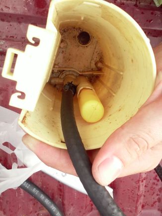 The 3/16 hose going to the bottom of the module. With the pressure being so minor, I felt comfortable securing it with a good zip tie.