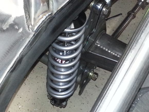 Coil-overs are installed.