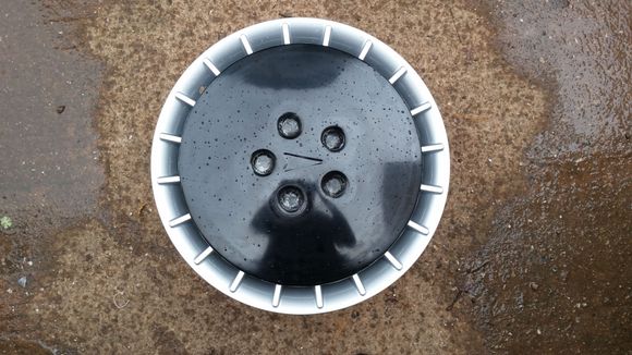 Fabricated bowling ball hubcap plug for the mould for 17" wheels.