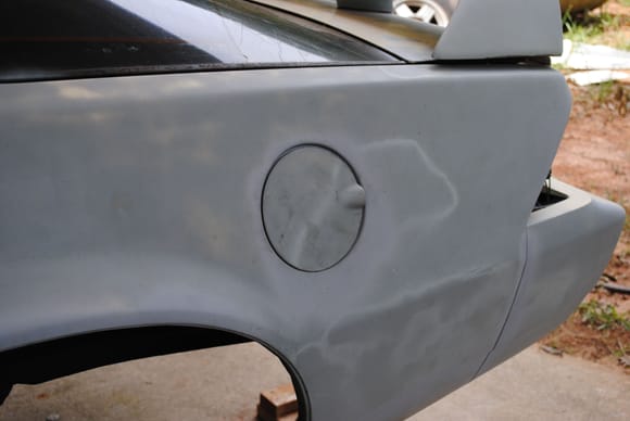 Shows a normal gas door after the plastic tank install