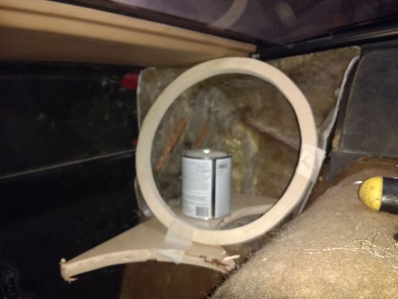 Trim the edges of your mold based off of your previous markings (check your markings  twice  cut once). Now it's time to place the mold back in the car and to fit the mounting ring. Close the trunk lid and take note of your clearance. Use whatever you have to brace the ring in position.