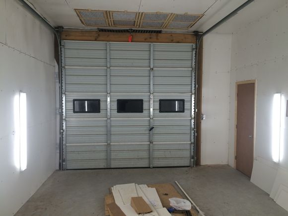 Down-Draft ceiling filter bank. They swing out of the ceiling to replace the filters.