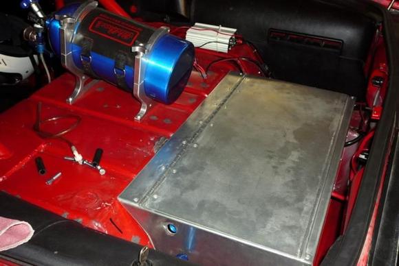 Custom enclosure with a 4 gallon RCI fuel cell, -10 fuel line, with a Optima Yellow top battery enclosed in another Taylor battery box.